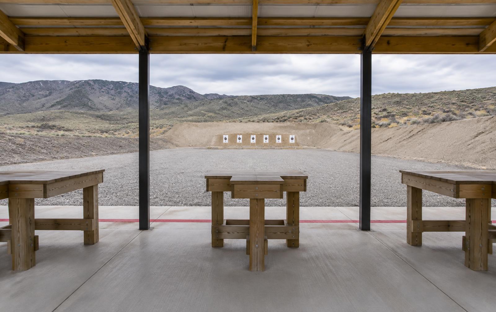 Covered shooting lanes with paper targets downrange